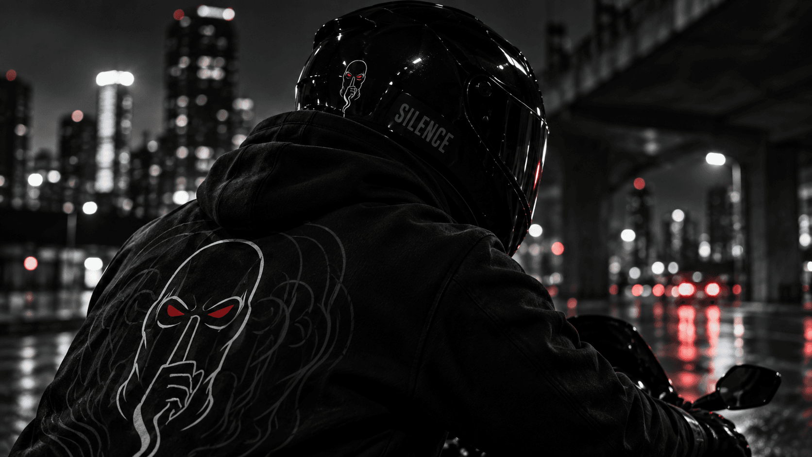 SILENCE rider on a rain-lit city road